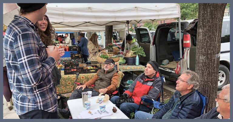 Elderly Men Set Up One-Of-A-Kind Booth – Wait Until You See Their Hilarious Sign